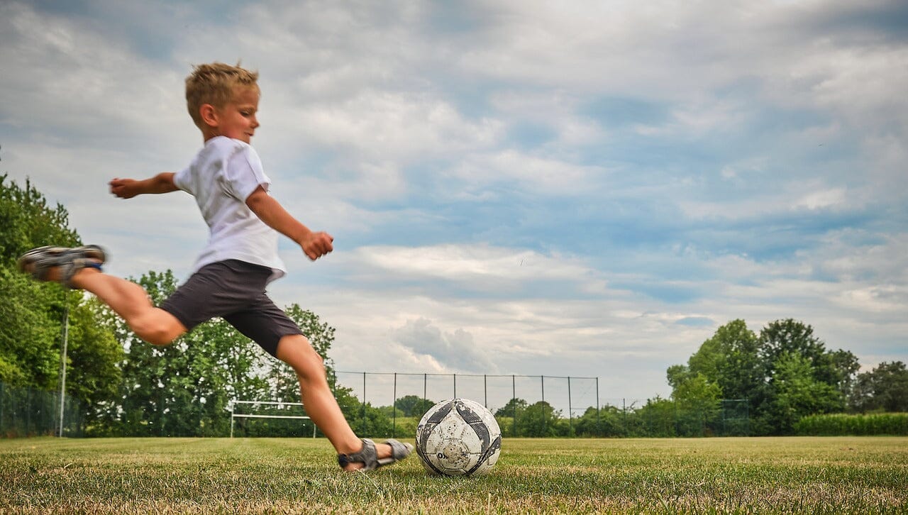 how fast can the average soccer player kick a ball